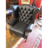 Wing & button back black leather armchair - As new