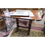 Mahogany swivel top table on claw feet