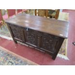 Early oak coffer with candle box and carved front