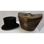 Top hat in leather case