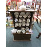 Apprentice piece dresser with miniature china