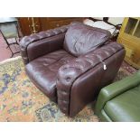 Oversized brown leather aviator armchair