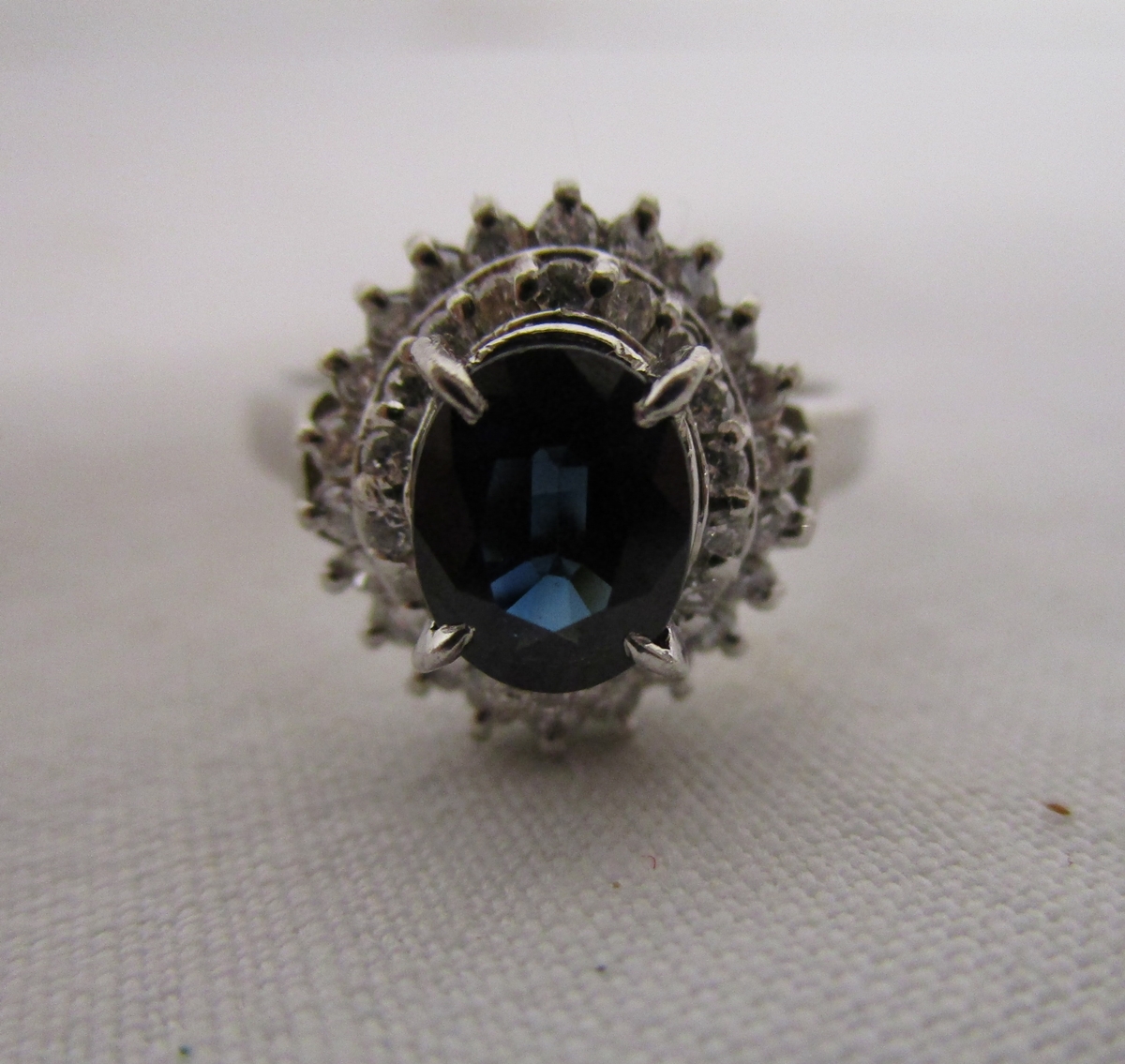 Fine platinum sapphire and diamond cluster ring