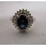 Fine platinum sapphire and diamond cluster ring