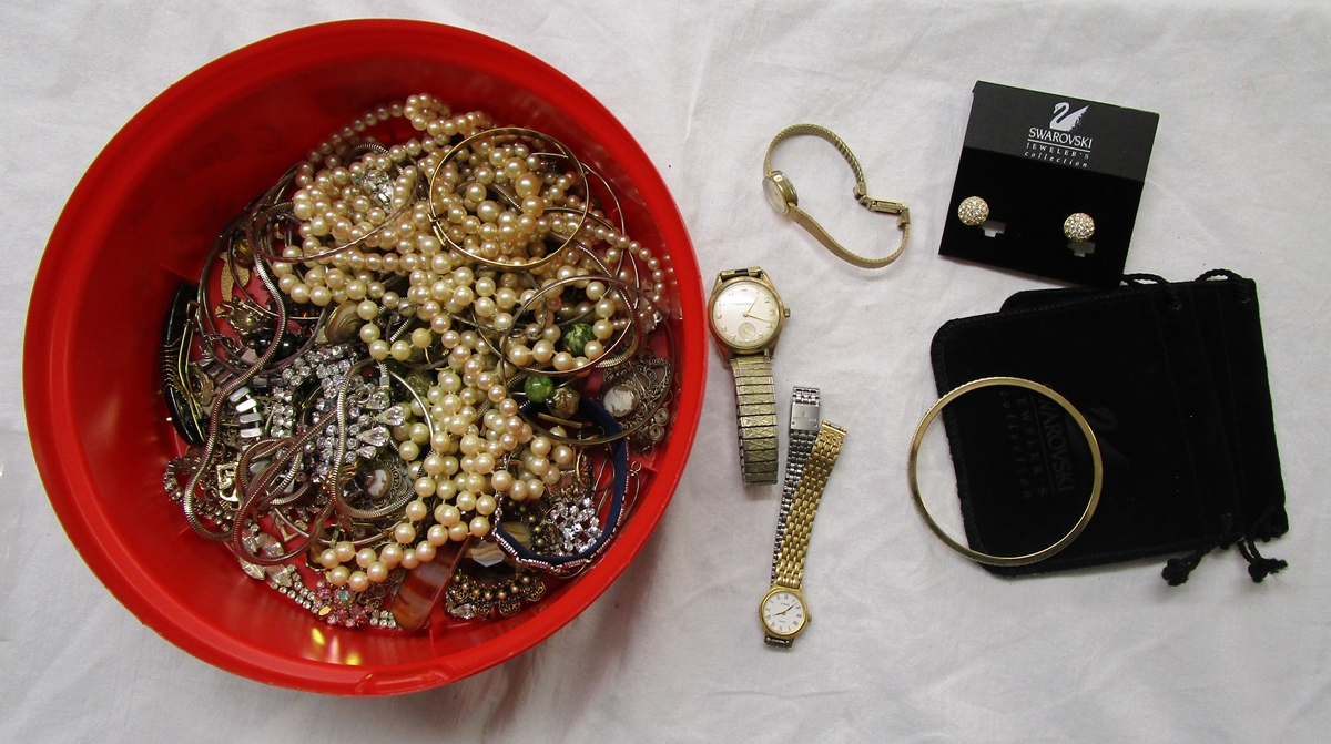 Tin of costume jewellery to include ladies watches