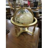 Small globe inlaid with semi precious stones