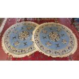 Pair of round Chinese rugs