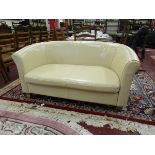 Cream 2 seater leather sofa