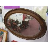 Oval & bevelled glass mahogany framed mirror