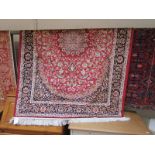 Red ground Keshan rug (1.9M x 1.4M)