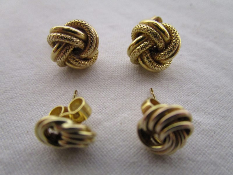 2 pairs of gold H/M lover knot earrings