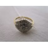 Gold baguette diamond cluster ring