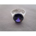 Silver ring set with large amethyst