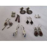 7 pairs of silver earrings