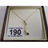 18ct diamond and sapphire pendant on chain