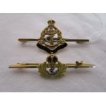 2 gold Royal Navy tie pins