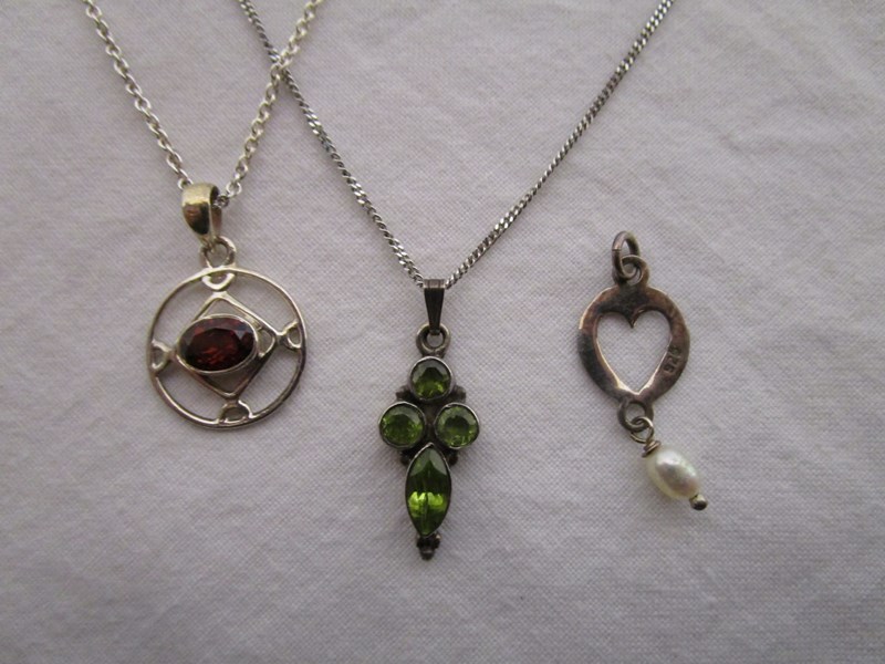 Silver garnet and peridot necklaces