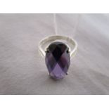 Silver ring set with large amethyst