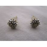 18ct gold stud earrings set with diamonds