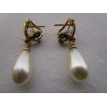 Pair of silver pearl drop earrings