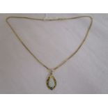 Gold opal pendant on chain