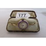 Boxed enamelled ladies wrist watch in good order