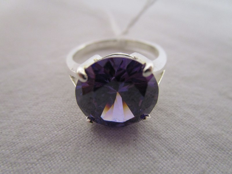 Silver ring set with large amethyst