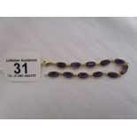 Gold amethyst set bracelet