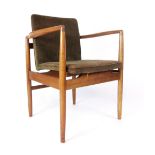 A 1950/60's elbow chair, the beech frame with upholstered pads,