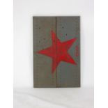 Two connected steelwork panels spray painted with a Russian star and 'CCCP',