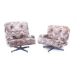 A pair of 'Kohinoor' lounge armchairs by Howard Keith Furniture on chromed four star bases,