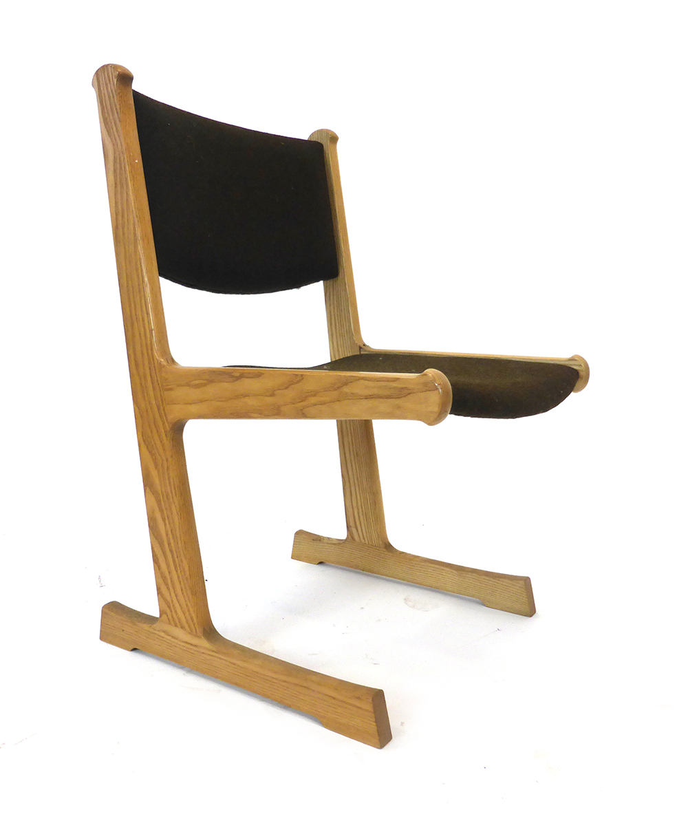 A 1970's Danish oak and upholstered slide chair by Cado CONDITION REPORT: Joints