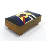 An Art Deco-type brass and enamelled box decorated with the sun's rays