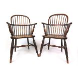 A pair of 19th century ash and elm Windsor chairs, the comb backs on turned legs and stretchers, h.