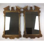 A pair of early 20th century, 18th century style gilt wood mirrors, h. 108 cm, w.