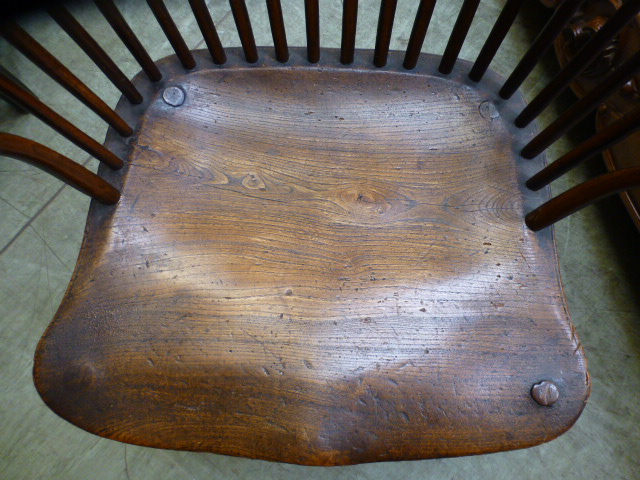 A 19th century oak and elm comb back Windsor chair with turned front legs and stretchers, h. - Image 8 of 8