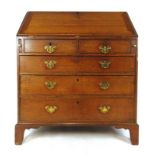 An 18th century oak bureau,