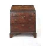 A 19th century burr elm and mahogany crossbanded bureau,