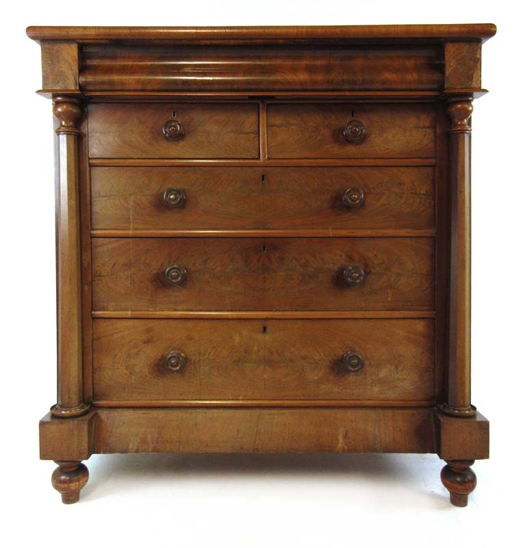 A 19th century mahogany chest of one secret over two short and three long drawers flanked by