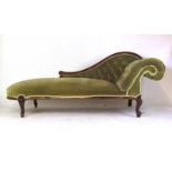 A Victorian mahogany chaise longue upholstered in an olive green cut fabric on cabriole legs, h.