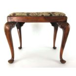 an early 20th century 18th century style walnut stool,