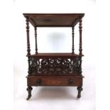 An Edwardian walnut and marquetry canterbury table with pierced gallery to top on turned supports