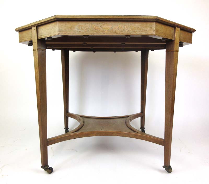 An Edwardian rosewood and inlaid centre table,