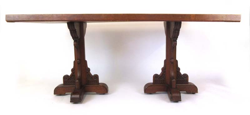 A late 19th century Puginesque oak dining table,