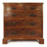 A late 18th century mahogany and crossbanded chest of two short over three long drawers on later