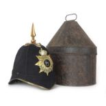 A British Home Service pattern blue cloth officers helmet with a gilt helmet plate for The Royal