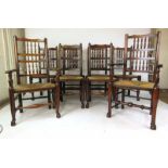 A harlequin set of eight (6+2) early 20th century elm spindle back dining chairs with rush seats, h.
