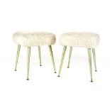 A pair of 1960's woolen stools with gold plastic tapering legs
