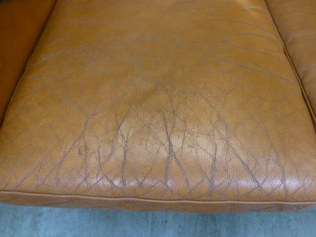 A 1970's tan leather three seater sofa on beech legs, - Image 4 of 13