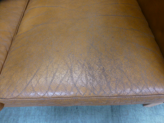 A 1970's tan leather three seater sofa on beech legs, - Image 8 of 13